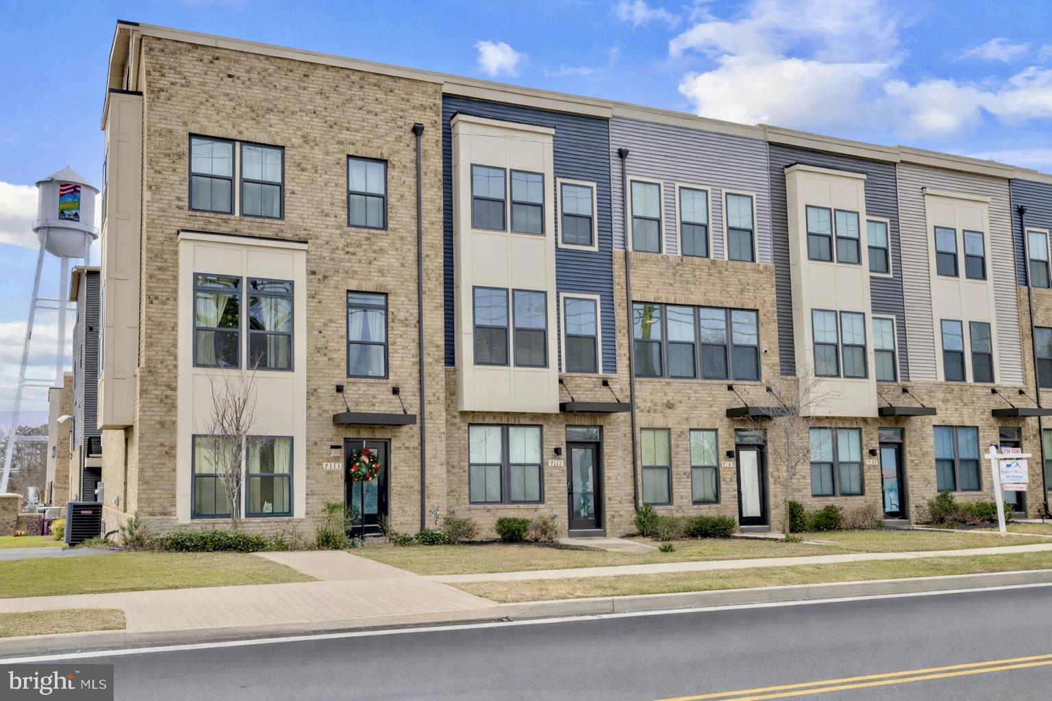 7111 Sollers Point Road Baltimore, MD 21222 - Photo 50 of 61 a view of a brick building next to a yard