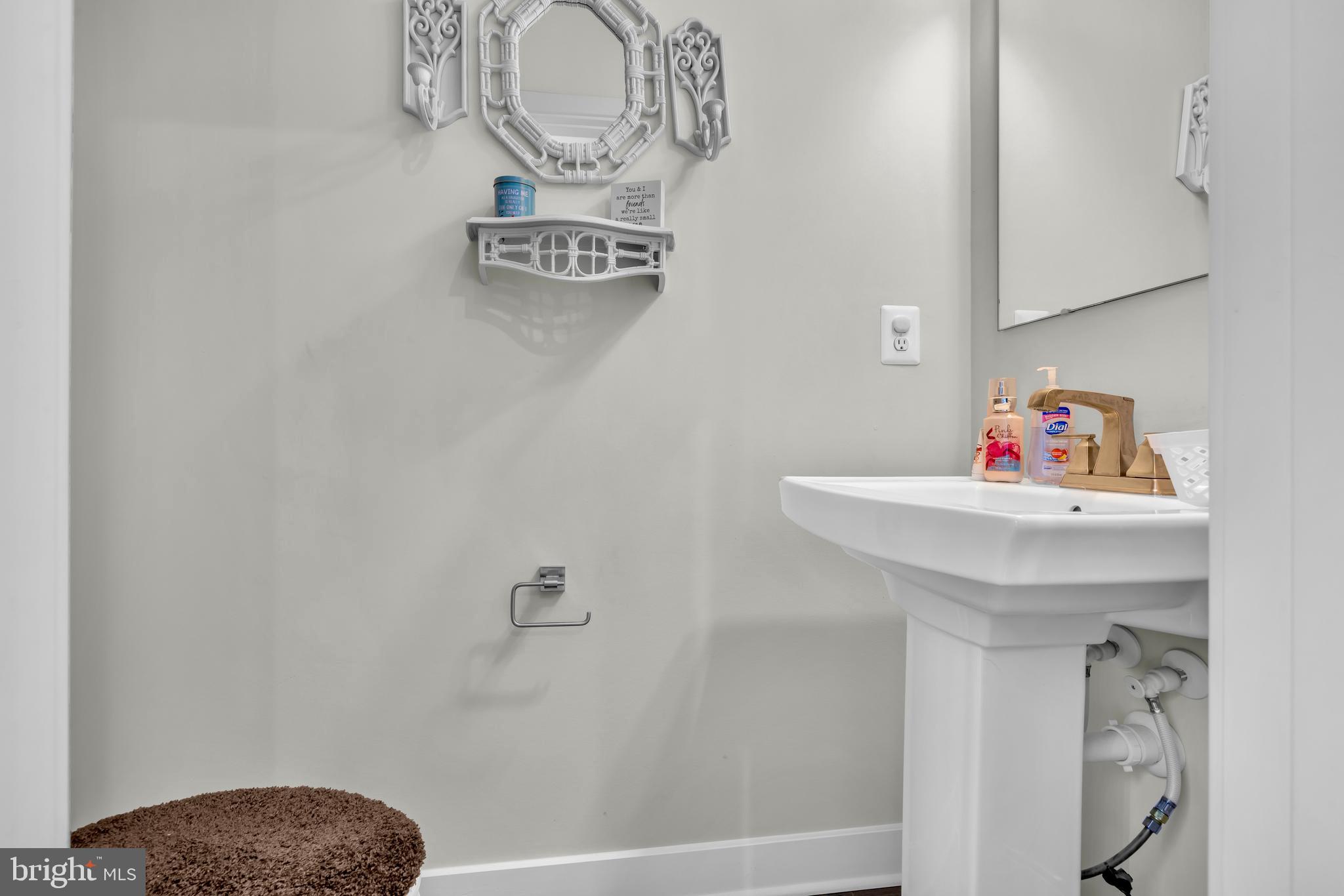 7111 Sollers Point Road Baltimore, MD 21222 - Photo 53 of 61 a bathroom with a sink and a shower