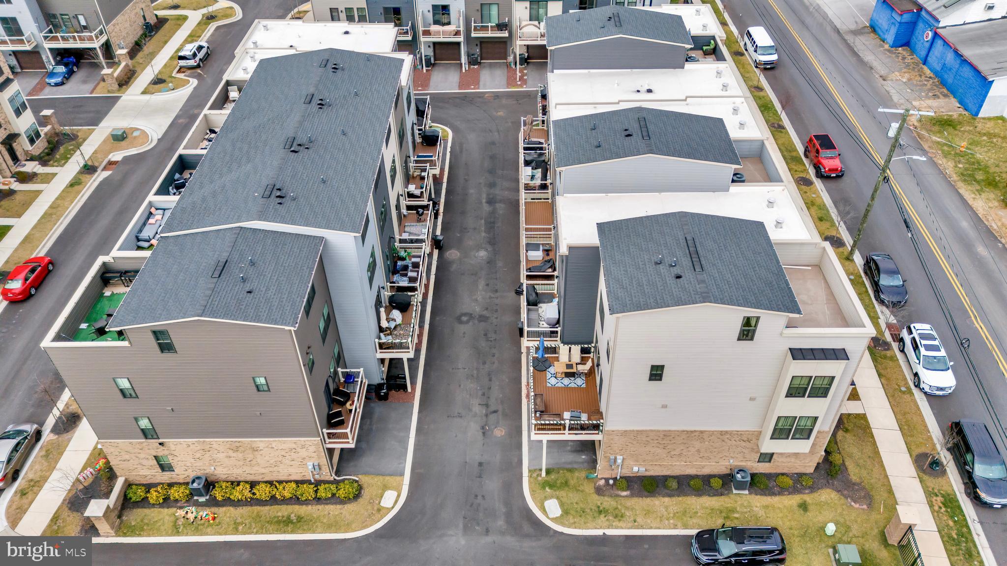 7111 Sollers Point Road Baltimore, MD 21222 - Photo 60 of 61 an aerial view of a house with a swimming pool