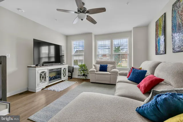 a spacious bedroom with a bed and window