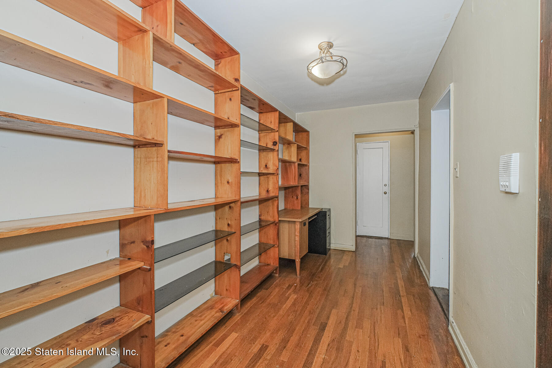 36 Dahill Road, Unit 4F Brooklyn, NY 11218 - Photo 5 of 25 a view of a room with wooden floor and a window
