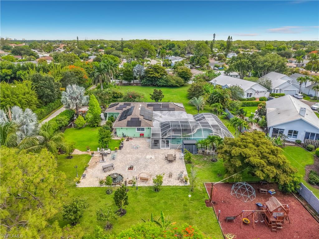 2280 Capri Court Naples, FL 34105 - Photo 1 of 49 an aerial view of a house with a garden