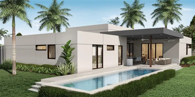 a view of a house with palm trees