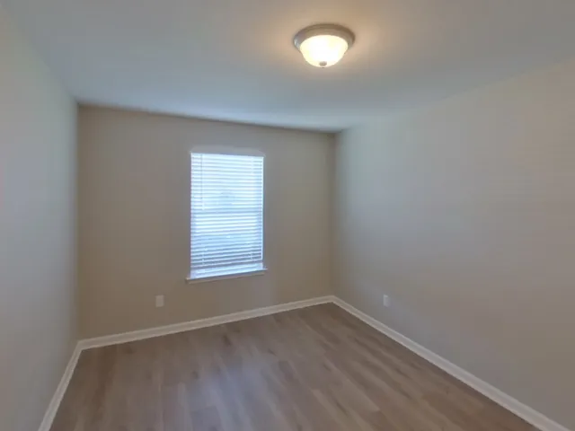 an empty room with a window