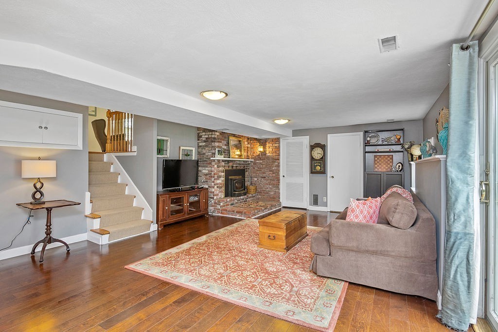 81 Cornell Road Marblehead, MA 01945 - Photo 21 of 28 a living room with furniture and a flat screen tv
