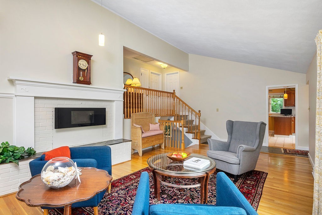 81 Cornell Road Marblehead, MA 01945 - Photo 7 of 28 a living room with furniture and a fireplace
