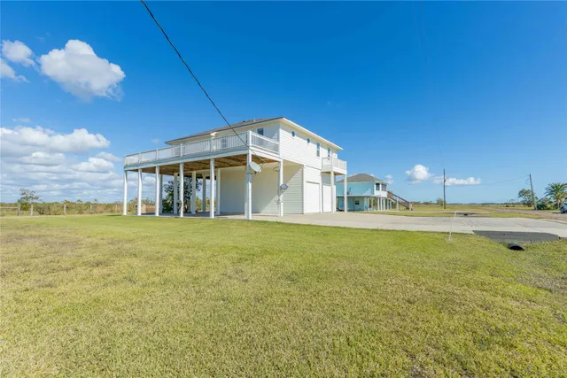 a view of an ocean & house