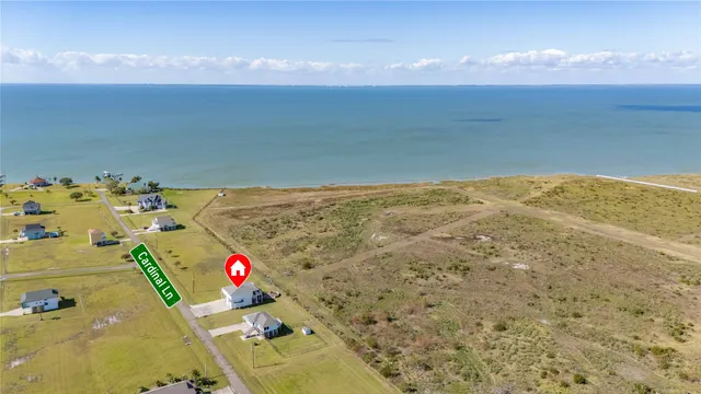 a view of a swimming pool with a yard