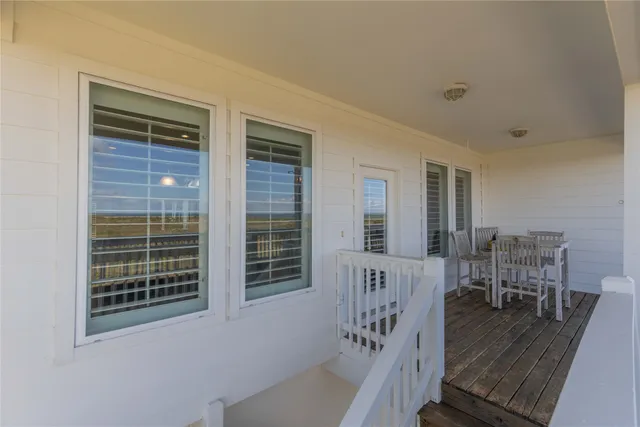 a view of a living room and dining room