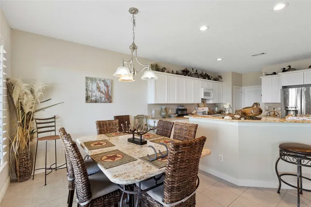 a view of a dining room with furniture