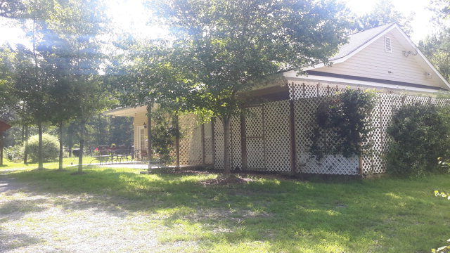2100 Allen Road Culloden, GA 31016 - Photo 1 of 19 a view of a back yard of the house