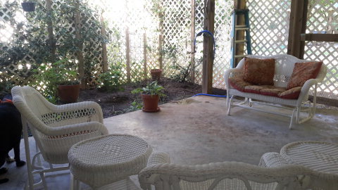 2100 Allen Road Culloden, GA 31016 - Photo 12 of 19 a outdoor living space with furniture and a potted plant