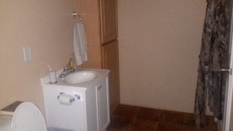 2100 Allen Road Culloden, GA 31016 - Photo 4 of 19 a bathroom with a sink and mirror