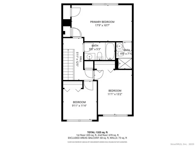 a picture of a bench in front of a building