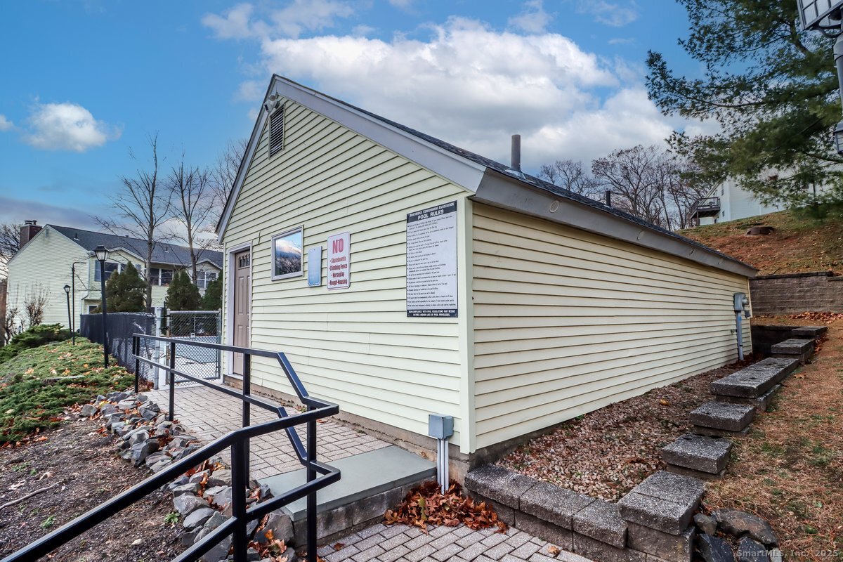 25 Padanaram Road, Unit 30 Danbury, CT 06811 - Photo 23 of 24 a view of a house with backyard and sitting area