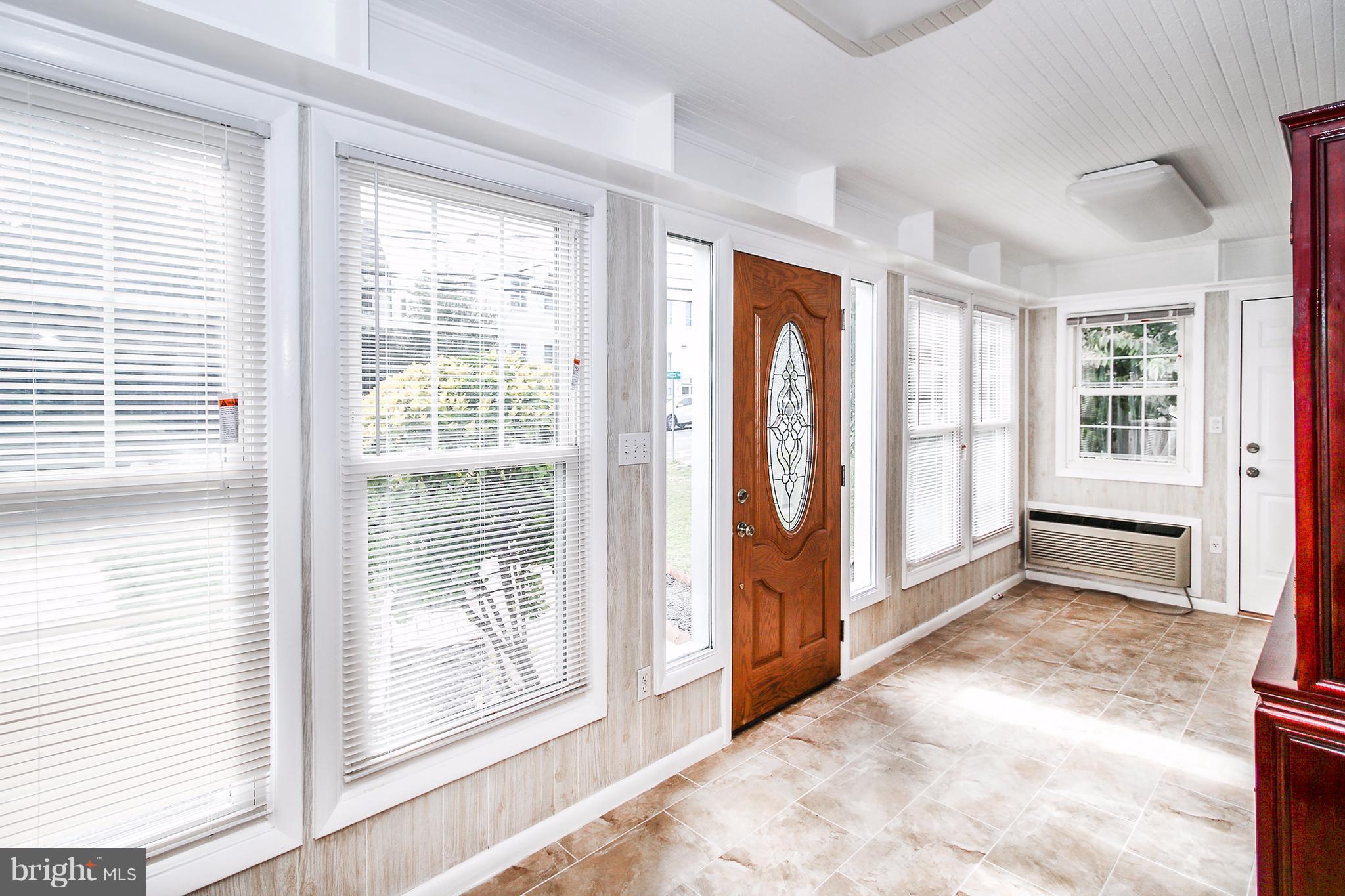 Enclosed front porch