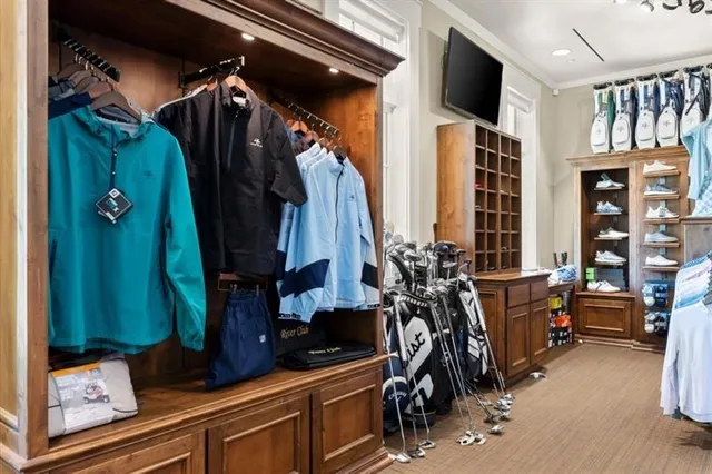 a kitchen with stainless steel appliances granite countertop a stove and a refrigerator