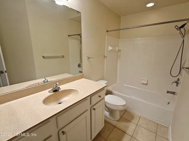 a view of a balcony with wooden floor