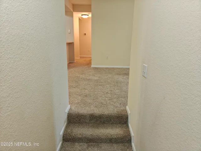 an empty room with fan