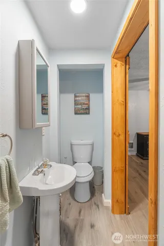 a bathroom with a sink and a toilet