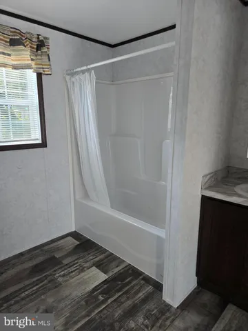 a bathroom with a bathtub