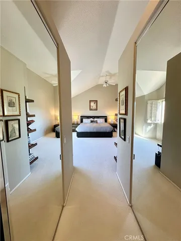 a view of living room with furniture and a flat screen tv