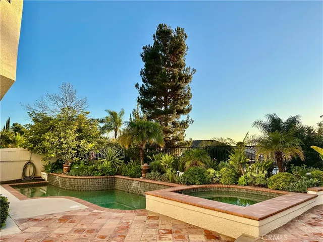 a picture of a bathroom with a shower and mirror