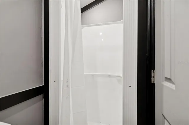 a view of a swimming pool with a lounge chairs