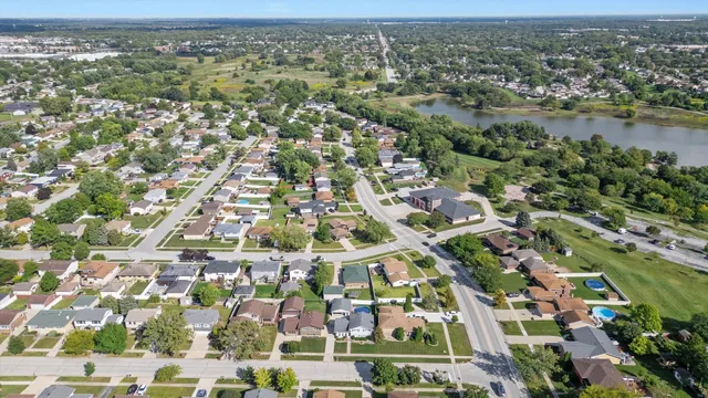 an aerial view of residential building with parking space