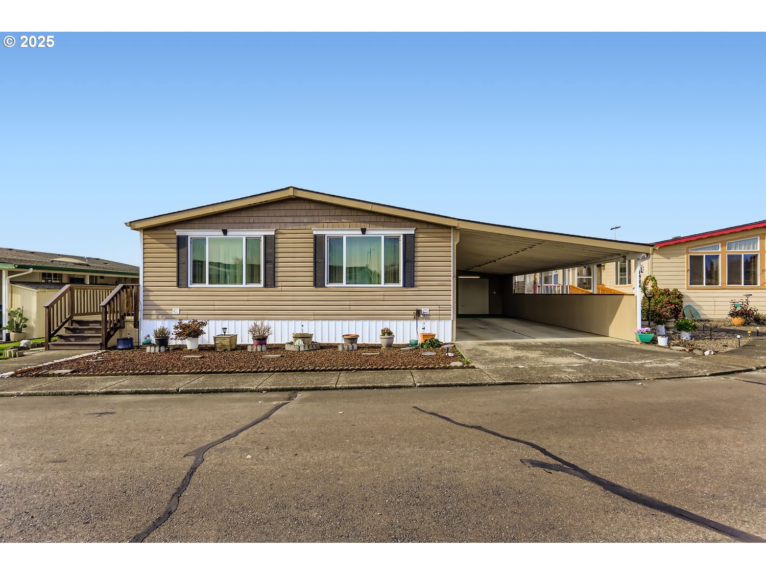 1504 Frontier Circle Forest Grove, OR 97116 - Photo 1 of 27 a front view of a house with a yard