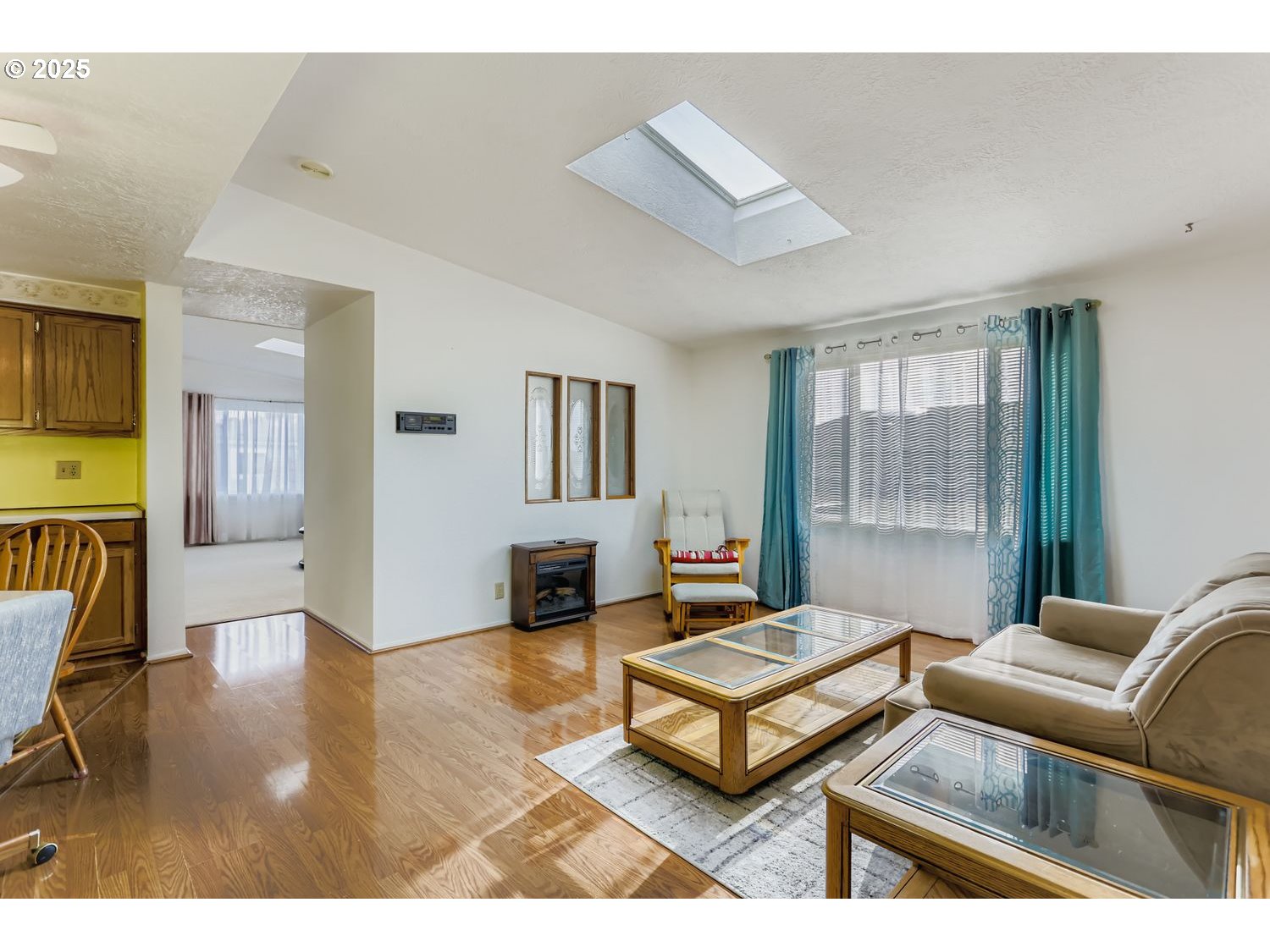 1504 Frontier Circle Forest Grove, OR 97116 - Photo 14 of 27 a living room with furniture and a table