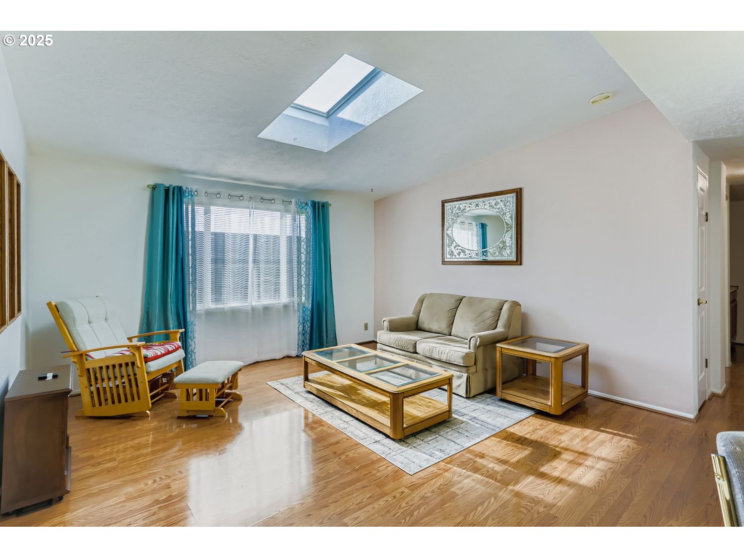 1504 Frontier Circle Forest Grove, OR 97116 - Photo 15 of 27 a living room with furniture rug and window