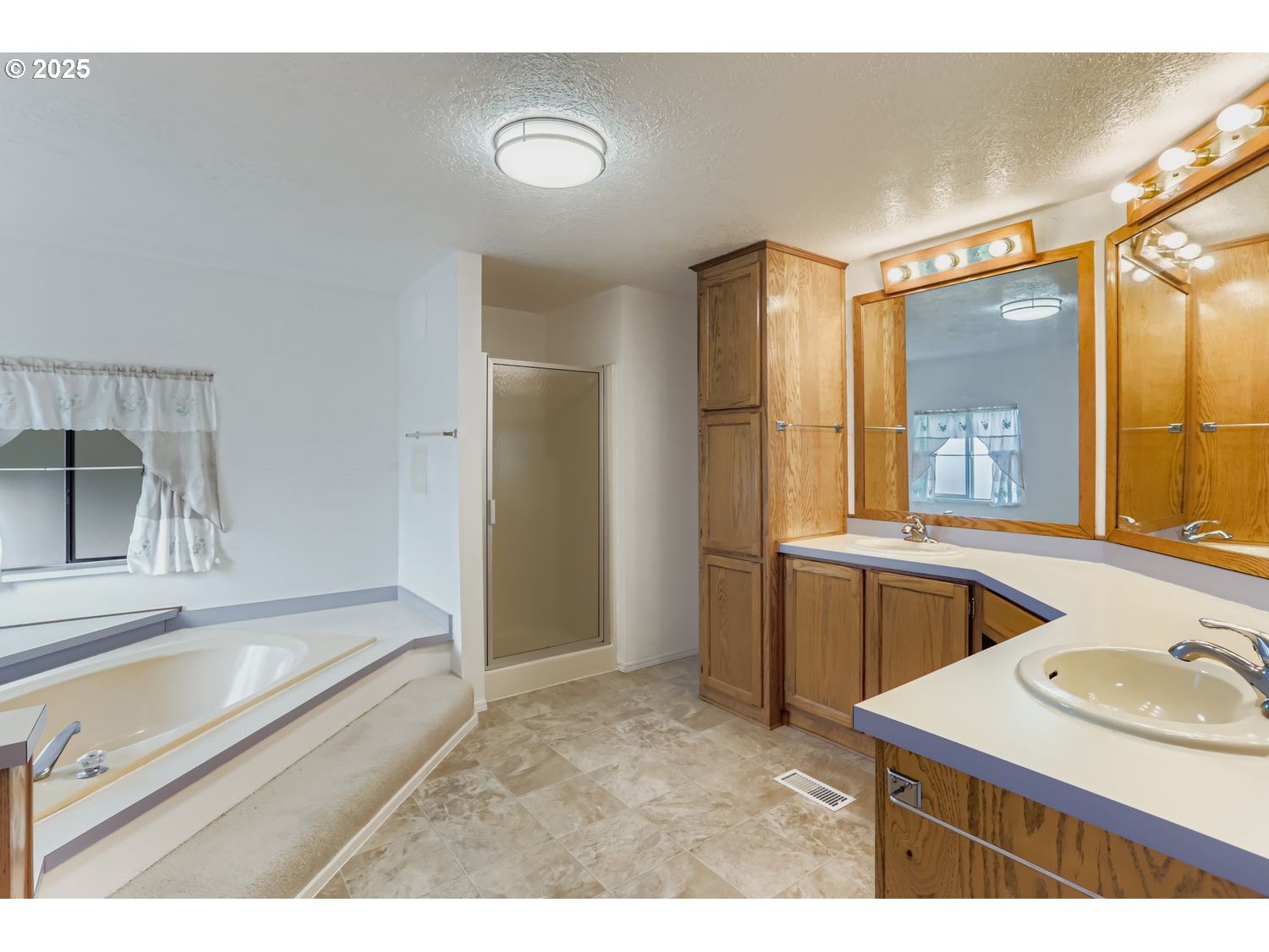 1504 Frontier Circle Forest Grove, OR 97116 - Photo 18 of 27 a bathroom with a sink double vanity and a mirror