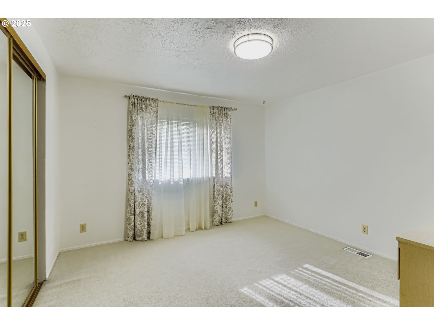 1504 Frontier Circle Forest Grove, OR 97116 - Photo 20 of 27 a view of an empty room with a window