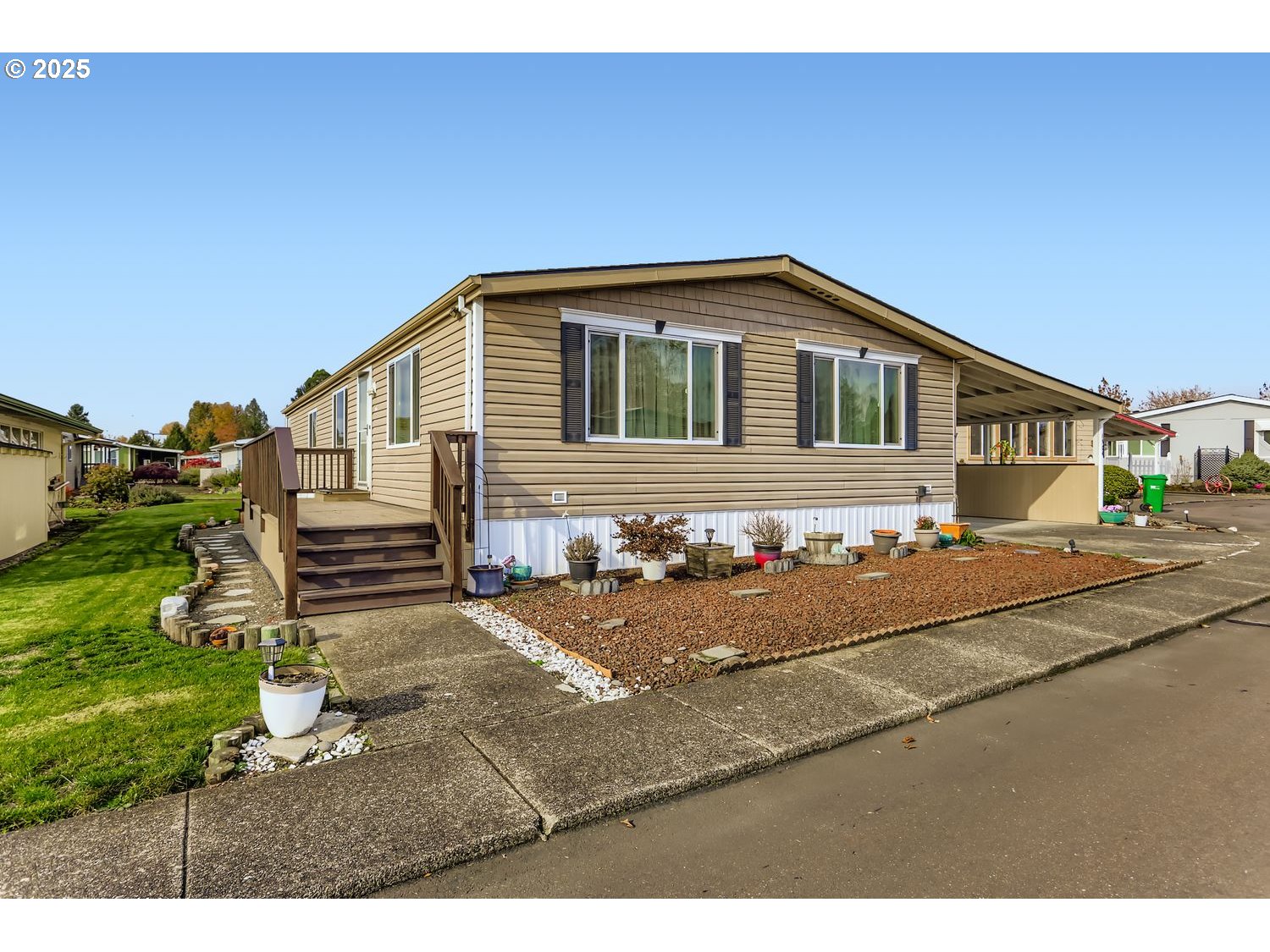 1504 Frontier Circle Forest Grove, OR 97116 - Photo 2 of 27 a front view of a house with a yard