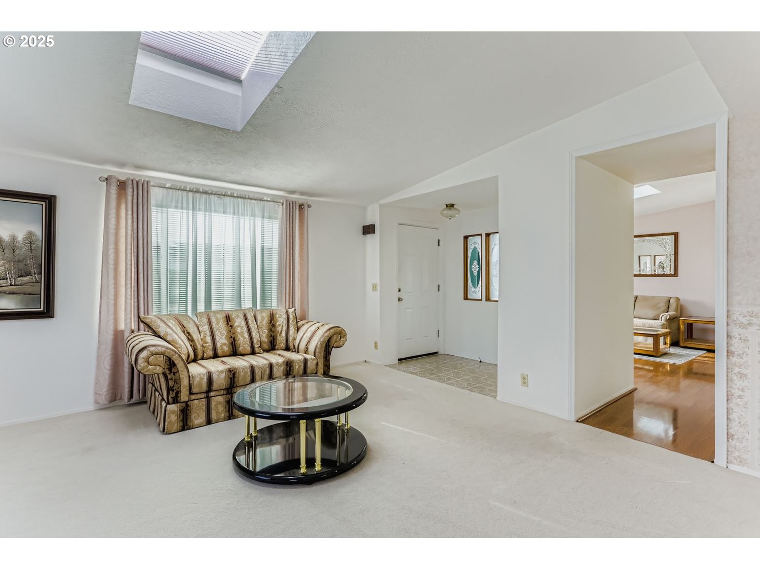 1504 Frontier Circle Forest Grove, OR 97116 - Photo 4 of 27 a living room with furniture and a large window