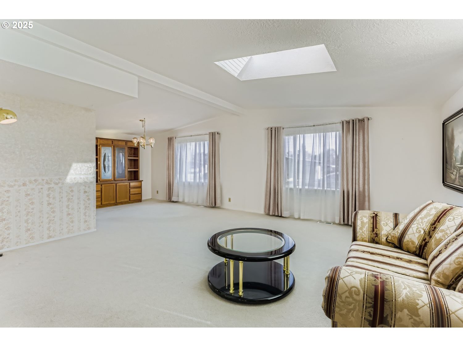 1504 Frontier Circle Forest Grove, OR 97116 - Photo 5 of 27 a living room with furniture a window and a potted plant