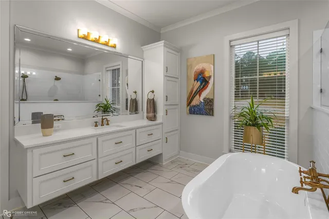 a bedroom with furniture and a flat screen tv