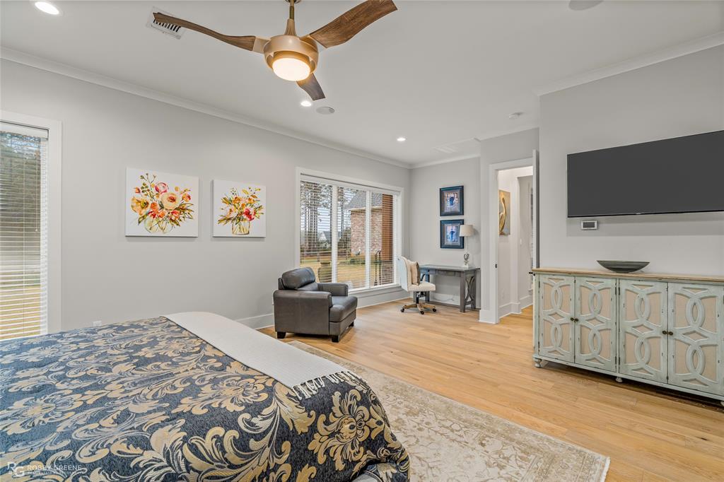 145 Crouch Road Benton, LA 71006 - Photo 20 of 40 a bedroom with furniture and a flat screen tv