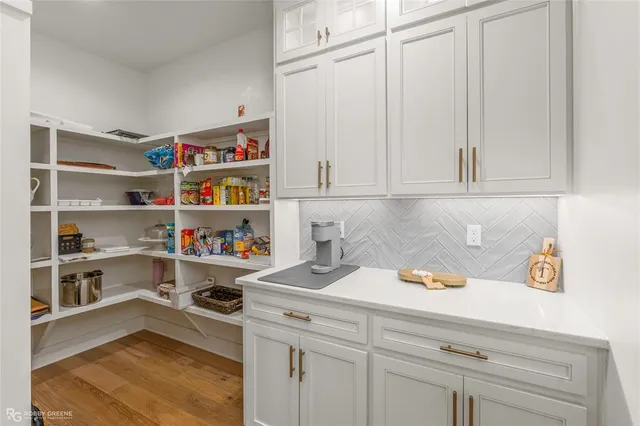 a view of a livingroom with furniture and a table