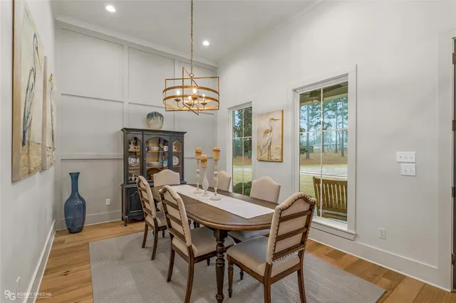 a workspace with wooden floor and book shelf
