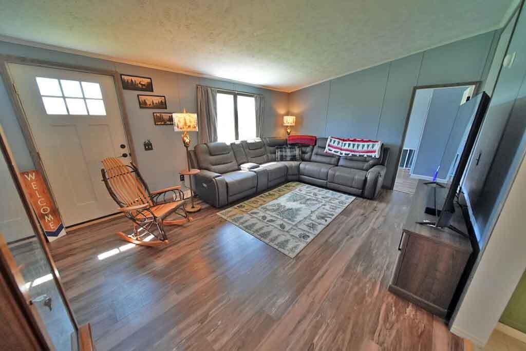 3157 Military Road Haynesville, ME 04497 - Photo 9 of 47 living-room-valuted-ceiling