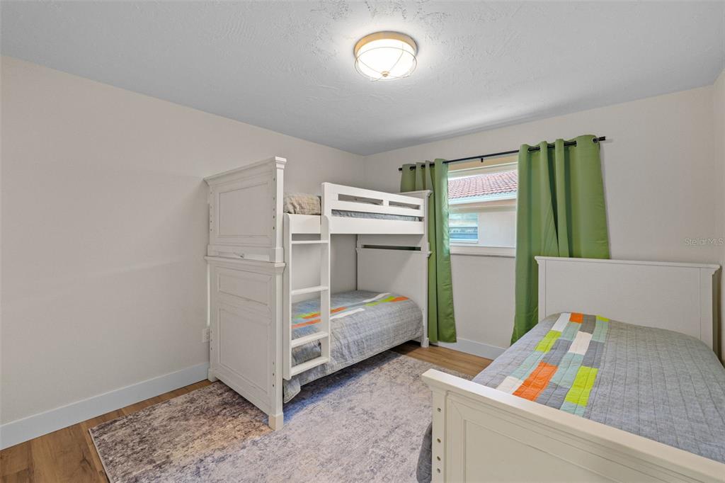 4968 South Shore Drive New Port Richey, FL 34652 - Photo 28 of 60 a room with storage and utility