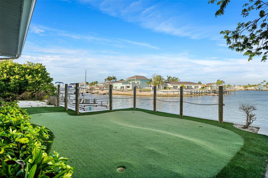 4968 South Shore Drive New Port Richey, FL 34652 - Photo 35 of 60 a view of a garden with an outdoor space