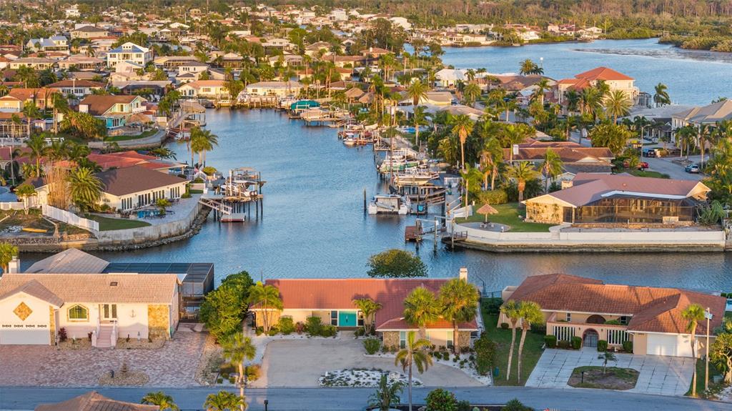 4968 South Shore Drive New Port Richey, FL 34652 - Photo 55 of 60 an aerial view of residential houses with outdoor space