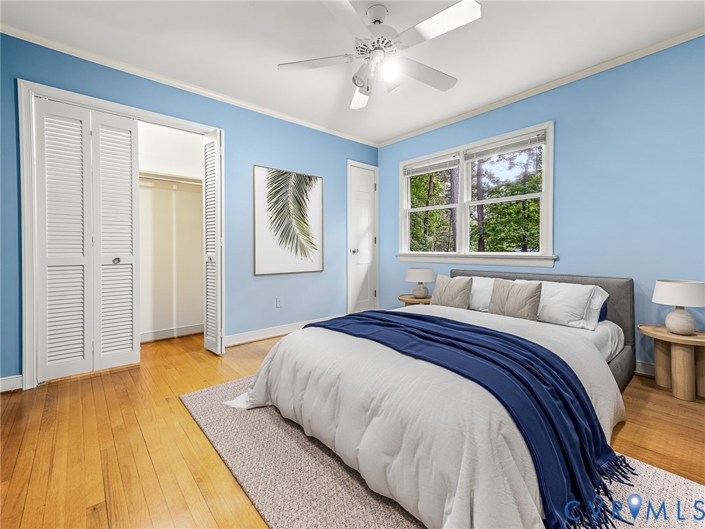 12911 Percival Street Chester, VA 23831 - Photo 12 of 21 a spacious bedroom with a bed and a window