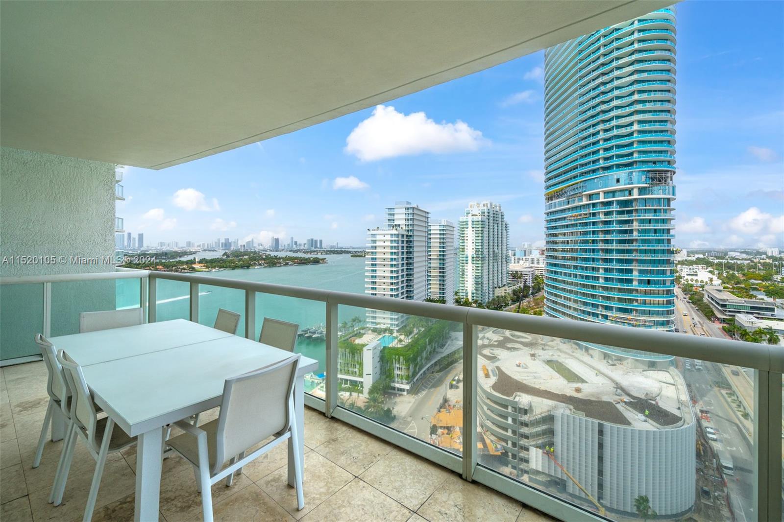 450 Alton Road, Unit 2006 Miami Beach, FL 33139 - Photo 34 of 51 a view of a balcony with furniture