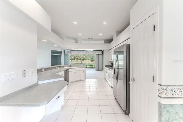 a bathroom with a sink toilet a mirror and shower