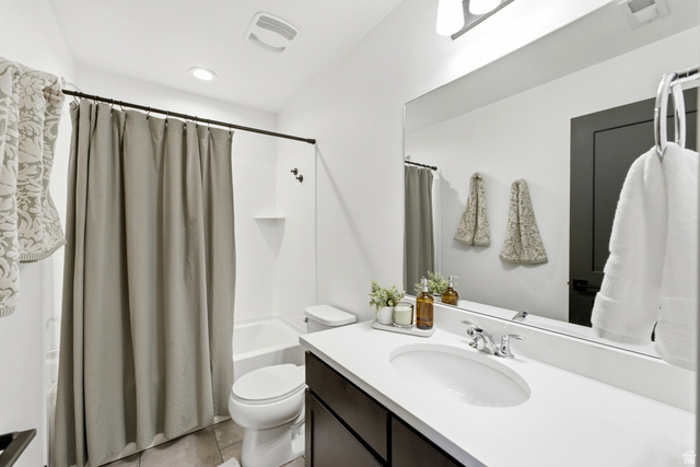 6039 North Westridge Road Heber City, UT 84032 - Photo 33 of 71 White vanity with integrated sink, chrome faucet, and expansive wall mirror