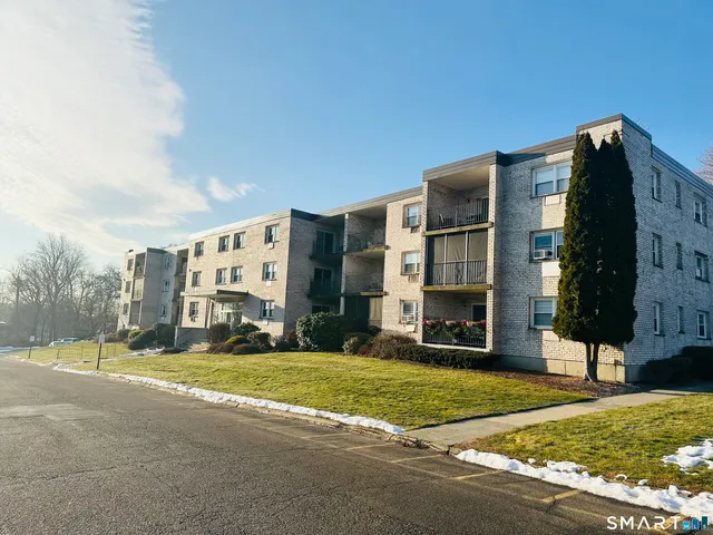 a view of a building with a street